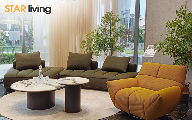 Brown three seater sofa and an individual mustard sofa with armrest